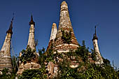 Inle Lake Myanmar. Indein, a cluster of ancient stupas  ruined and overgrown with bushes, just behind the village.